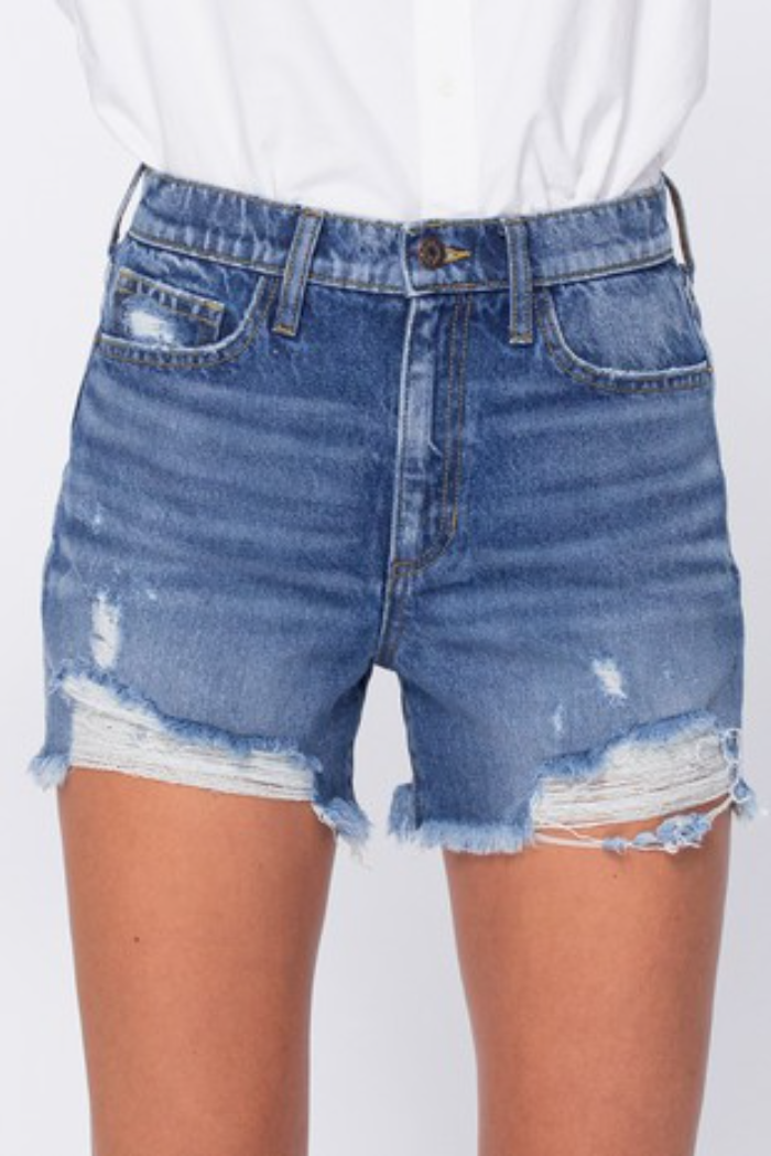 High rise denim shorts with frayed hem